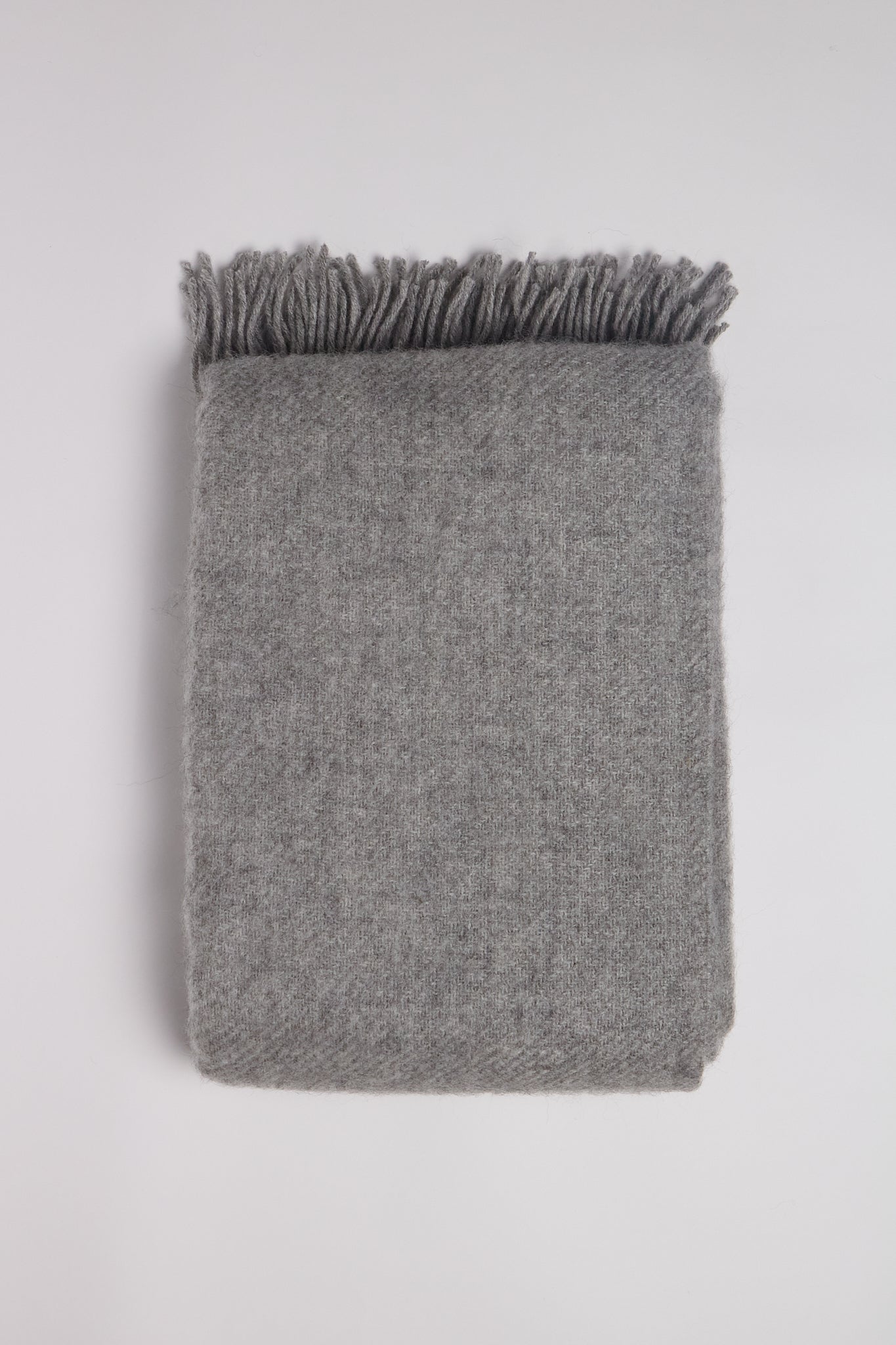 Klippan Gotland Wool Throw Blanket in Light Grey, curated by Shop Sommer in San Francisco.