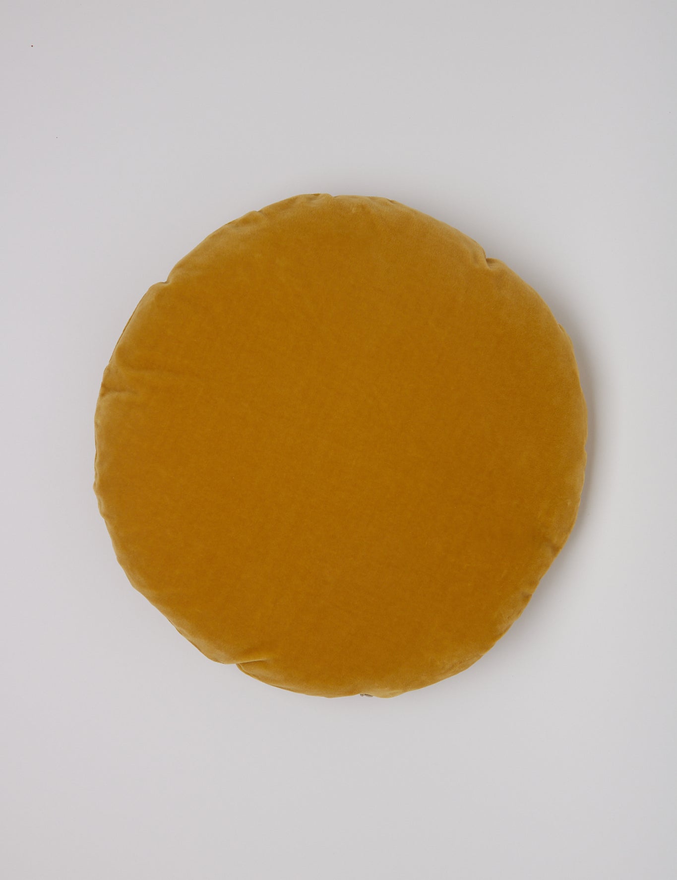 Christina Lundsteen Basic Round Cushion in Mustard, curated by Shop Sommer in San Francisco.