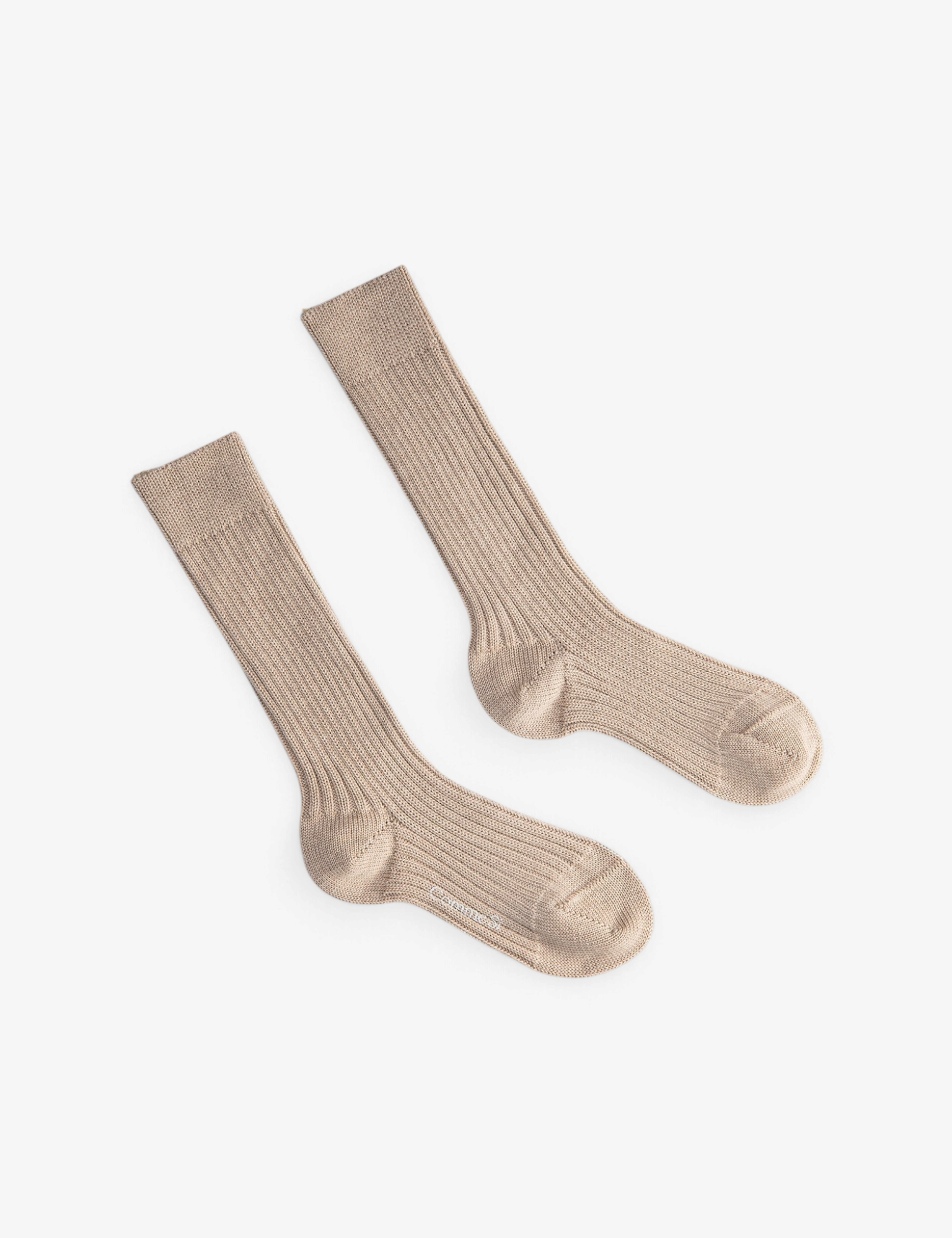 Sommer Merino Chunky Sock in beige, a thick ribbed knit mid-calf sock made in Italy for warmth and comfort.