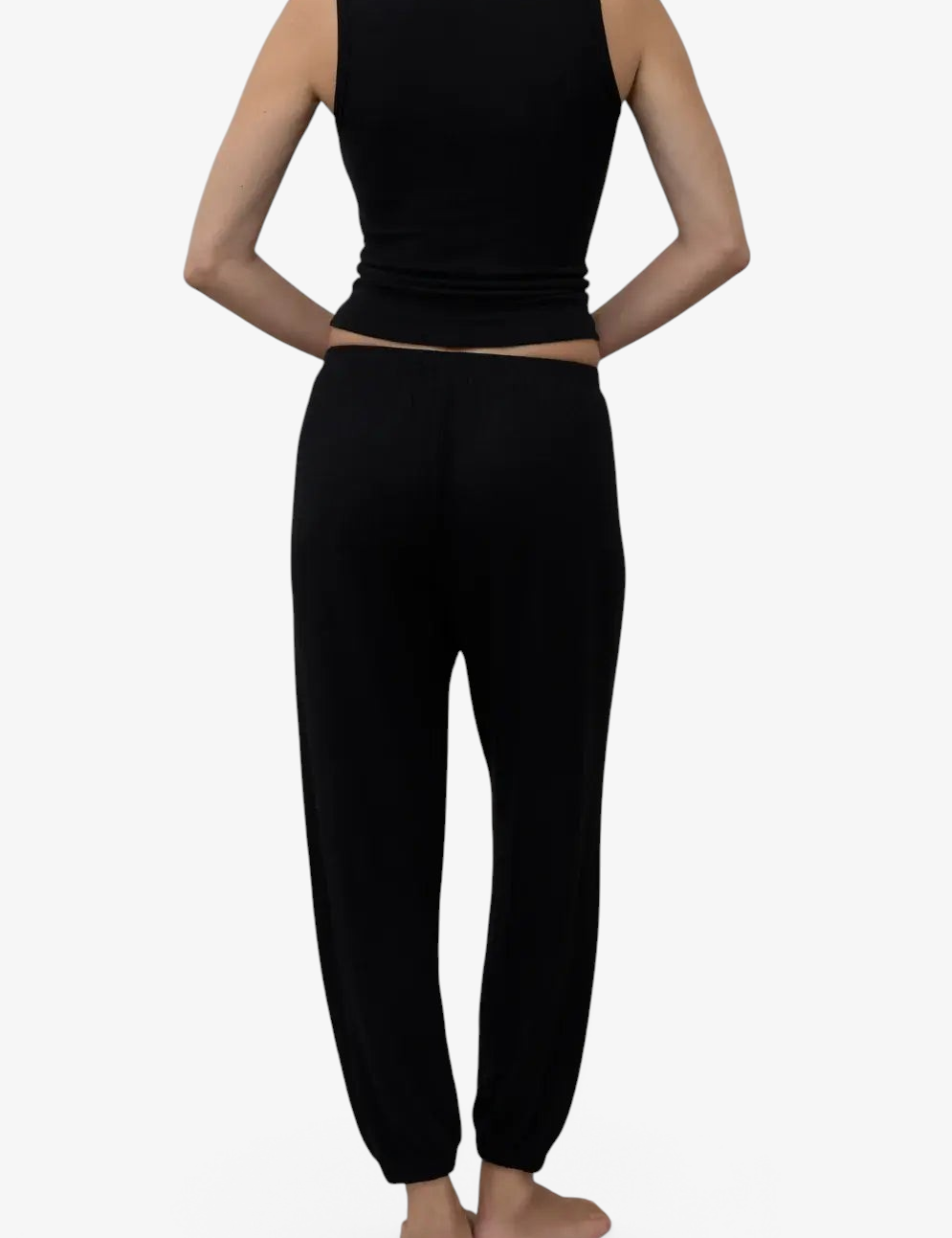Sommer black relaxed joggers in soft TENCEL Lyocell Hacci with elasticated waist and cuffs, back view