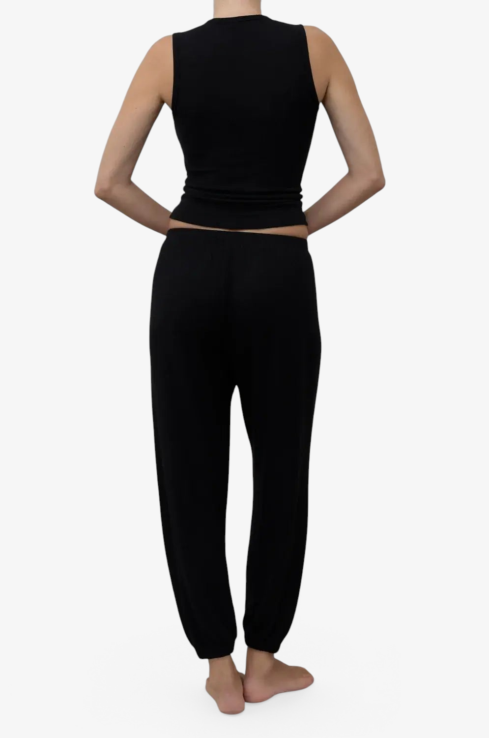 Sommer black relaxed joggers in soft TENCEL Lyocell Hacci with elasticated waist and cuffs, back view