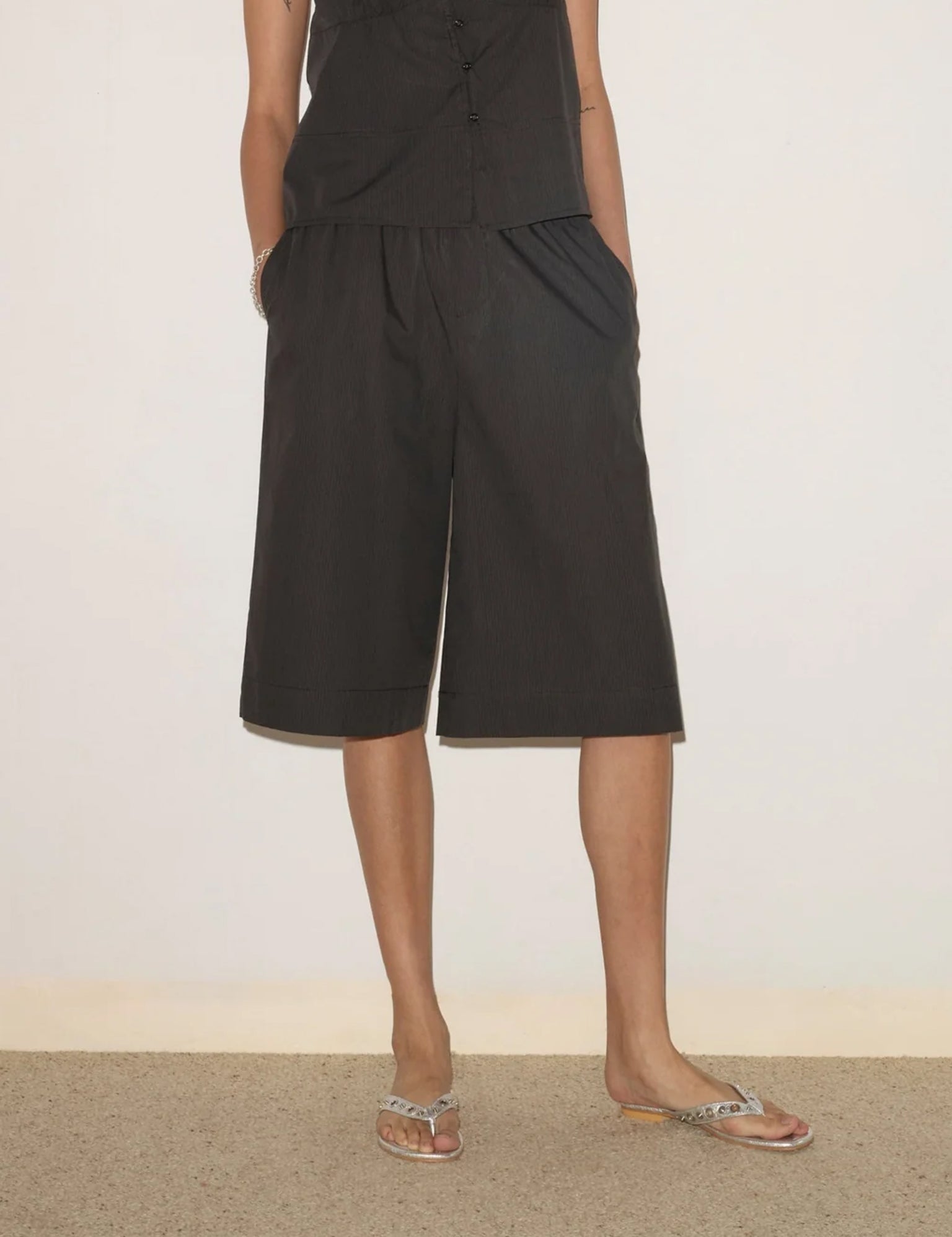 Deiji Studios Long Lounger in Black Stripe, curated by Shop Sommer in San Francisco.