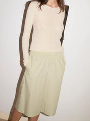Deiji Studios Long Lounger in Pistachio Stripe, curated by Shop Sommer in San Francisco.