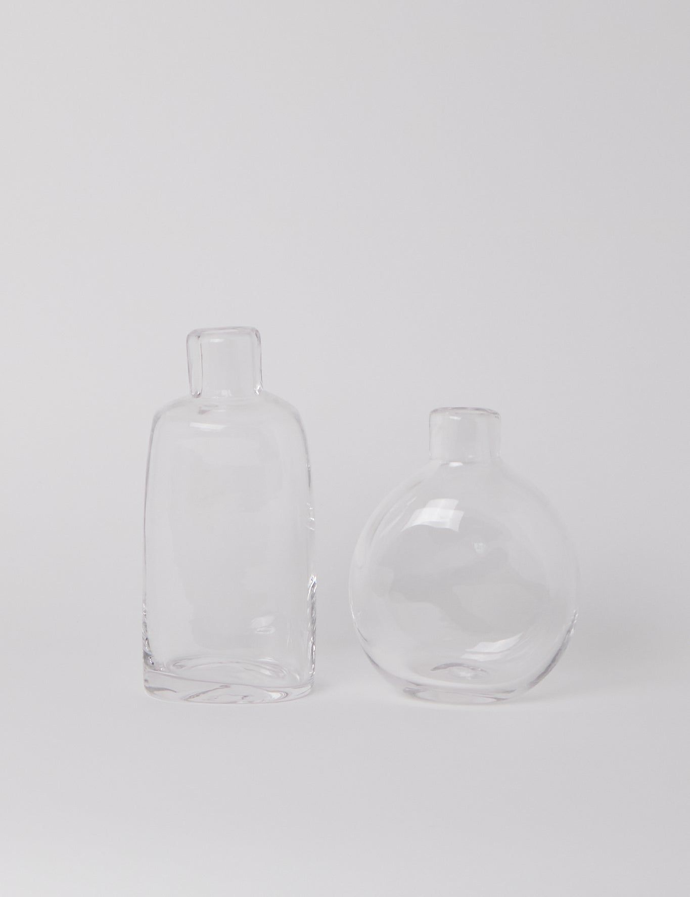 FRAMA Clear Round Glass Bottle, curated by Shop Sommer in San Francisco.