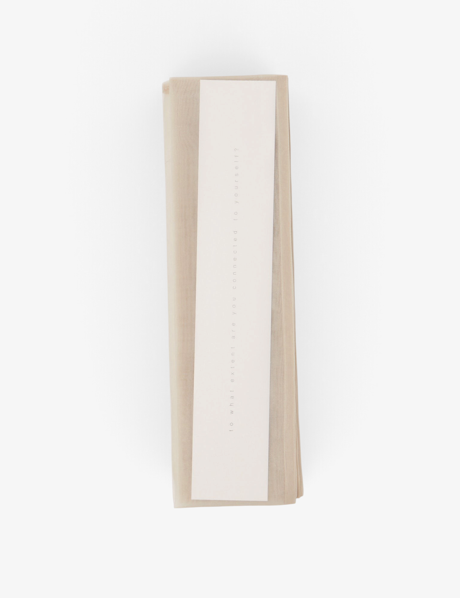 Sommer Iko Iko organza cord cover in a neutral beige tone, made from Japanese poly organza for home decor.