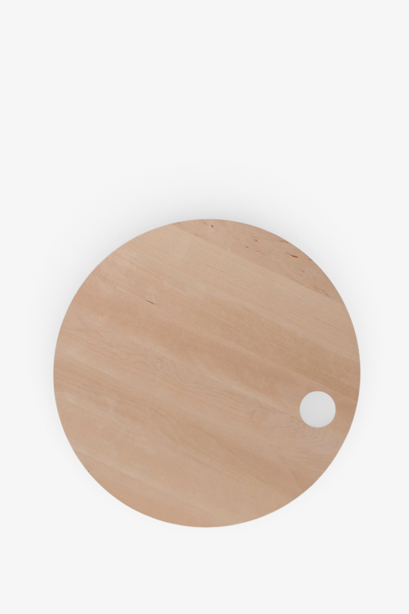 Iris Hantverk Round Birch Cutting Board, curated by Shop Sommer in San Francisco
