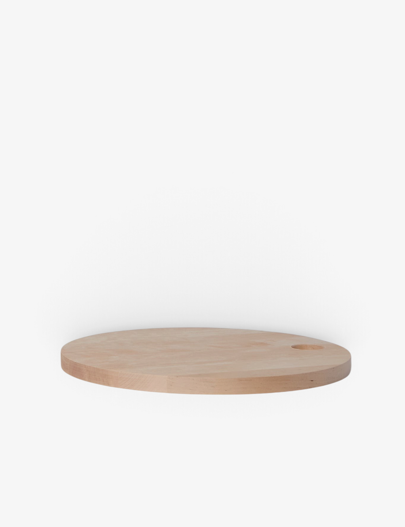 Iris Hantverk Round Birch Cutting Board, curated by Shop Sommer in San Francisco