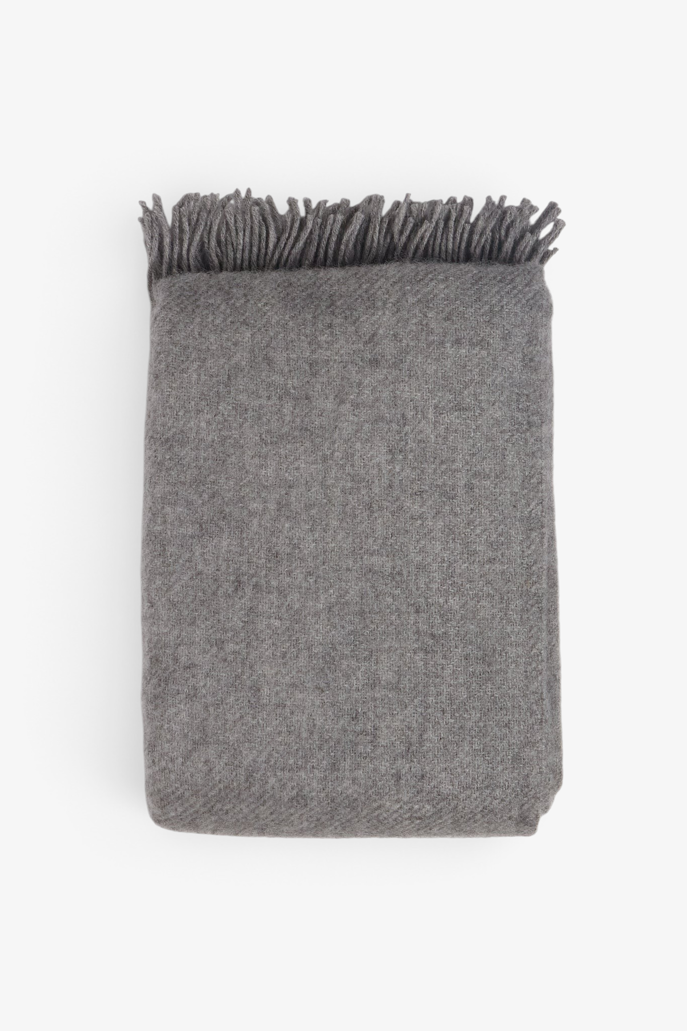 Klippan Gotland Wool Throw Blanket in Light Grey, curated by Shop Sommer in San Francisco.