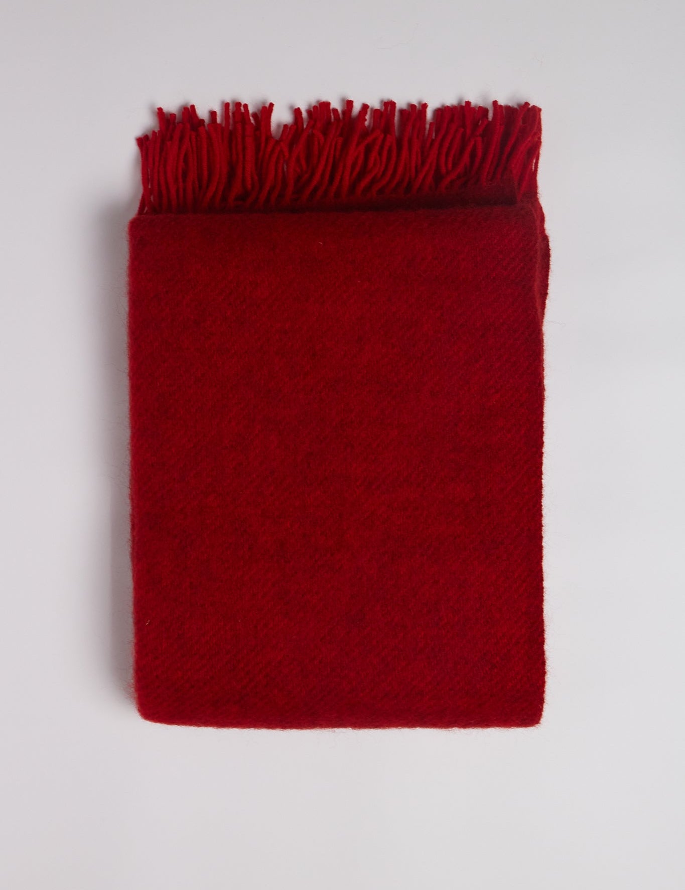 Klippan Gotland Wool Throw Blanket in Red, curated by Shop Sommer in San Francisco.