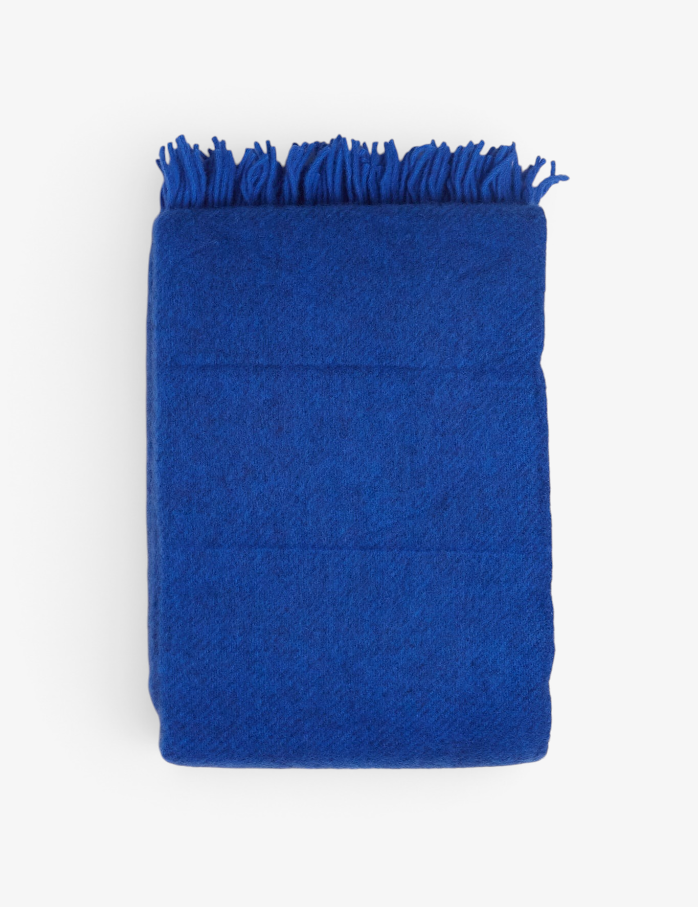 Klippan Gotland Wool Throw Blanket in Bauhaus Blue, curated by Shop Sommer in San Francisco.