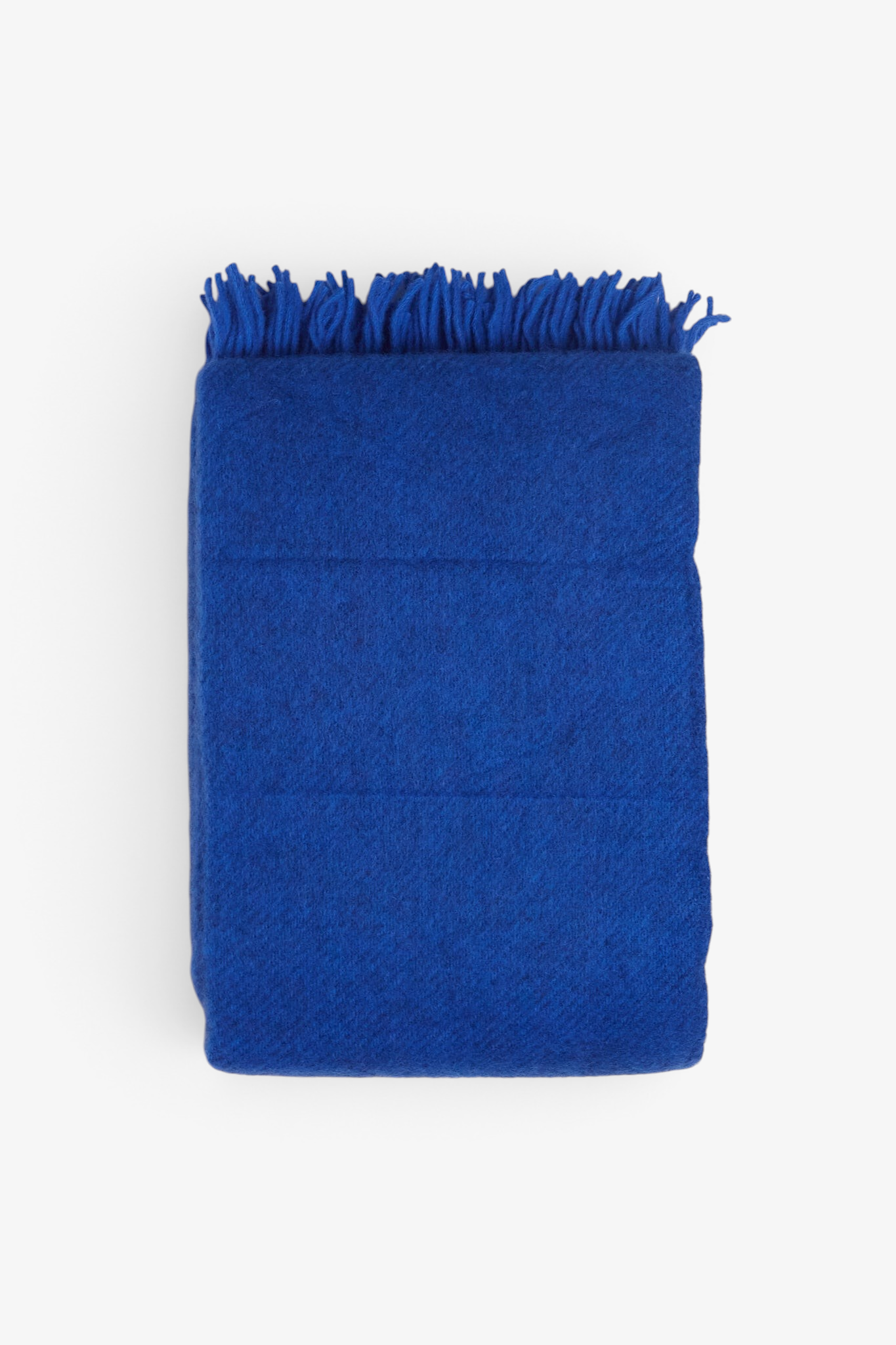 Klippan Gotland Wool Throw Blanket in Bauhaus Blue, curated by Shop Sommer in San Francisco.