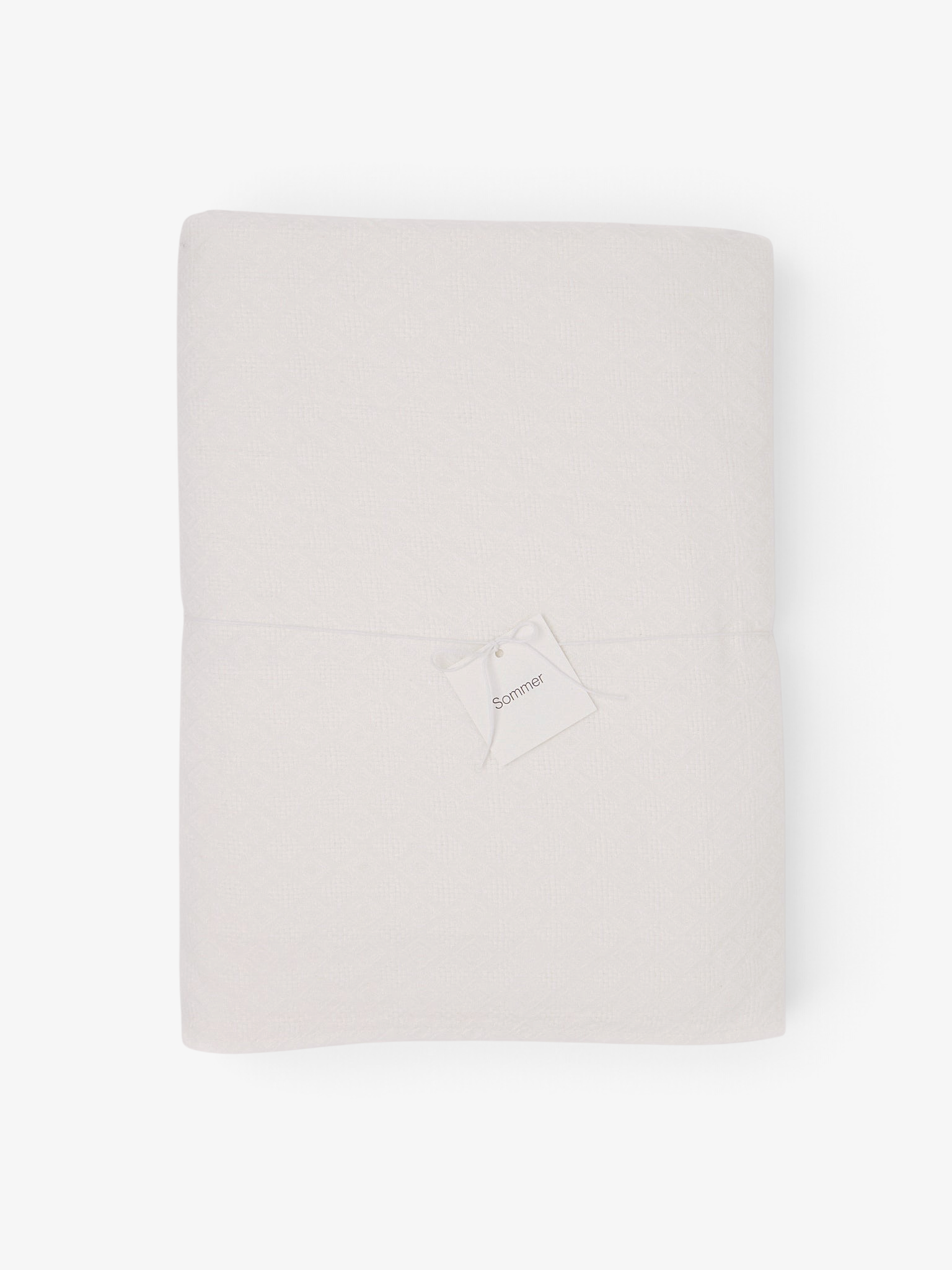 Sommer Ceremony Jacquard square tablecloth in white cotton linen with a subtle woven diamond motif