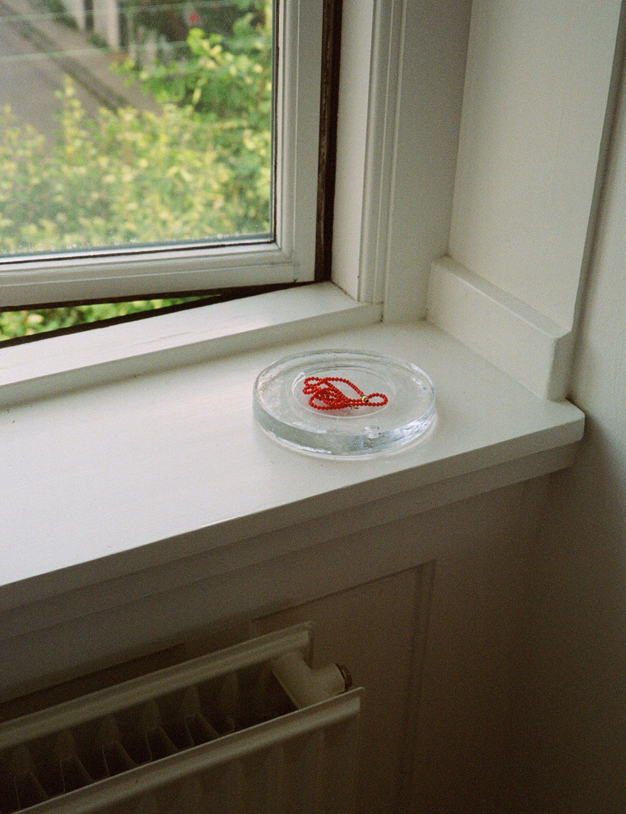 Nina Nørgaard Solid Glass Assiette Clear, curated by Shop Sommer in San Francisco.