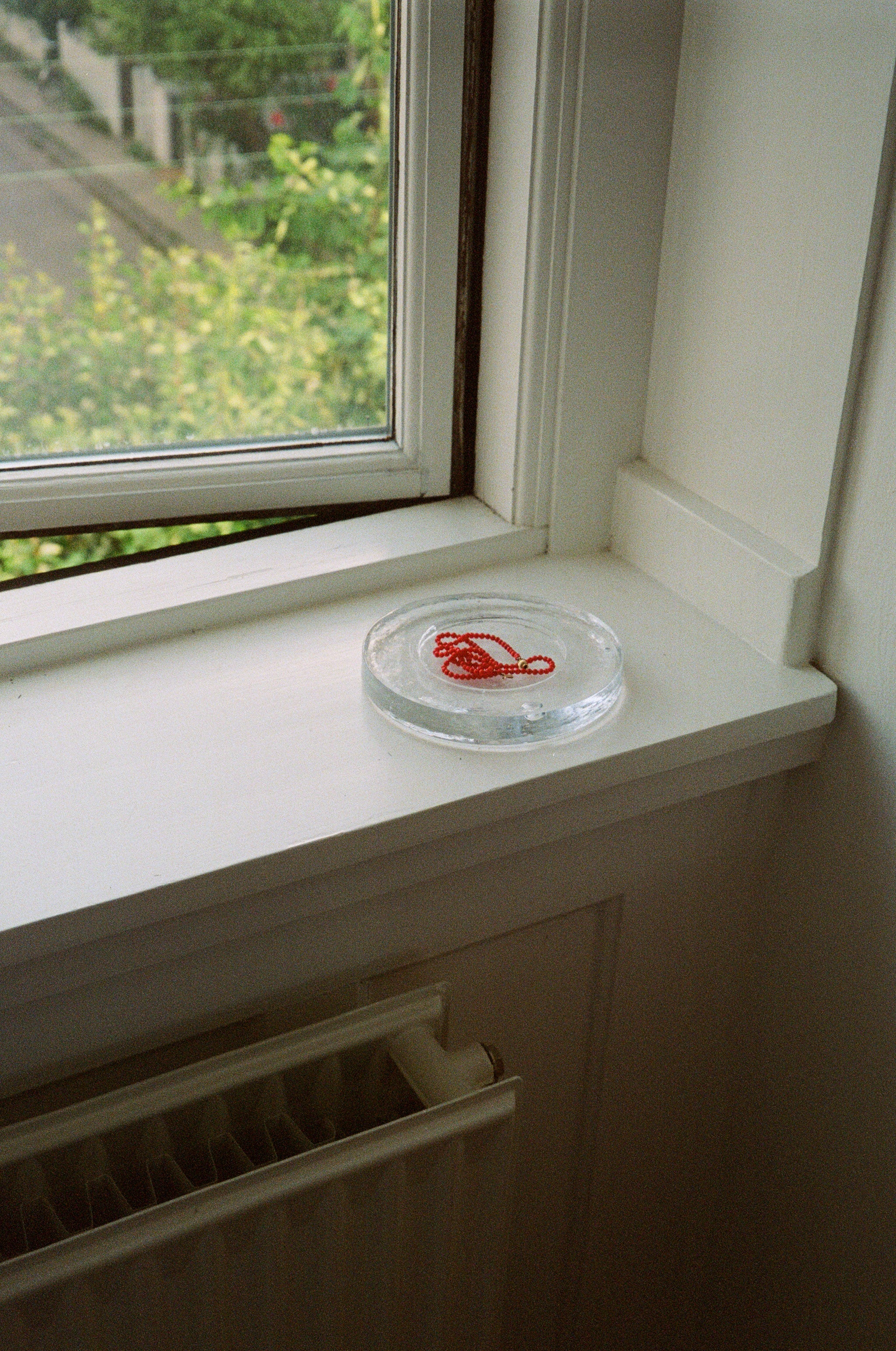 Nina Nørgaard Solid Glass Assiette Clear, curated by Shop Sommer in San Francisco.