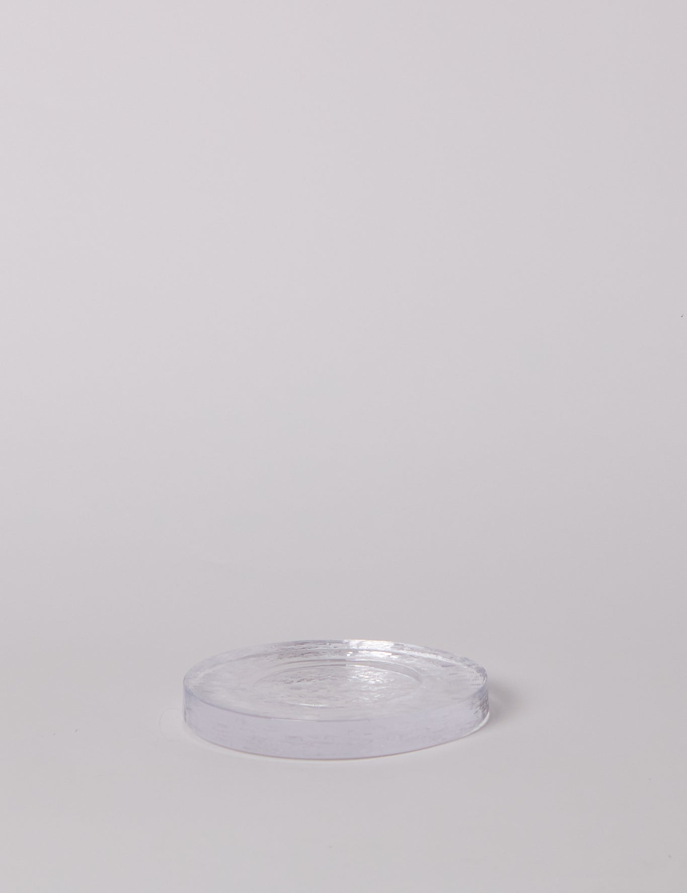 Nina Nørgaard Solid Glass Assiette Clear, curated by Shop Sommer in San Francisco.