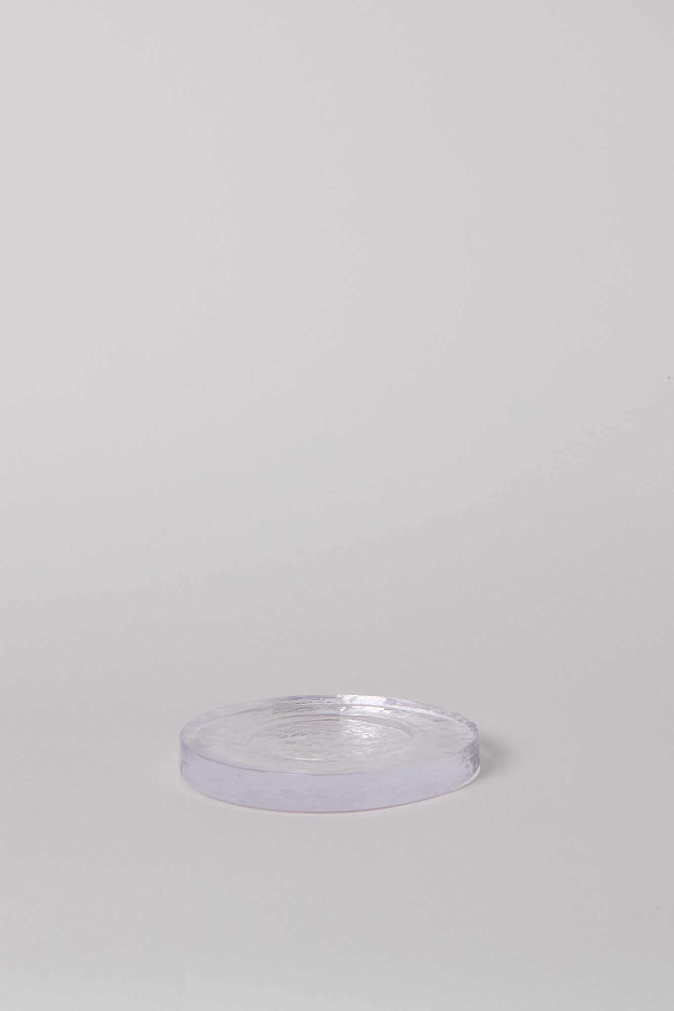 Nina Nørgaard Solid Glass Assiette Clear, curated by Shop Sommer in San Francisco.