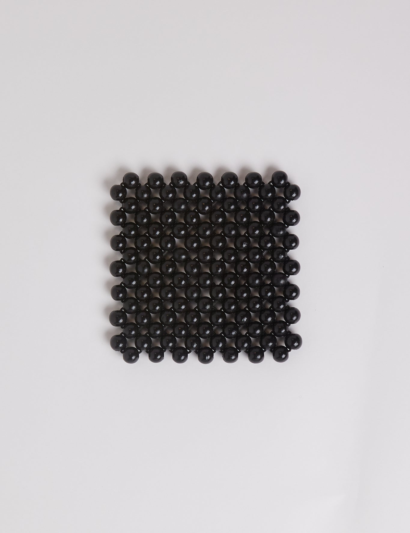 Pien Studios Black Lacquered Beaded Coasters, curated by Shop Sommer in San Francisco.