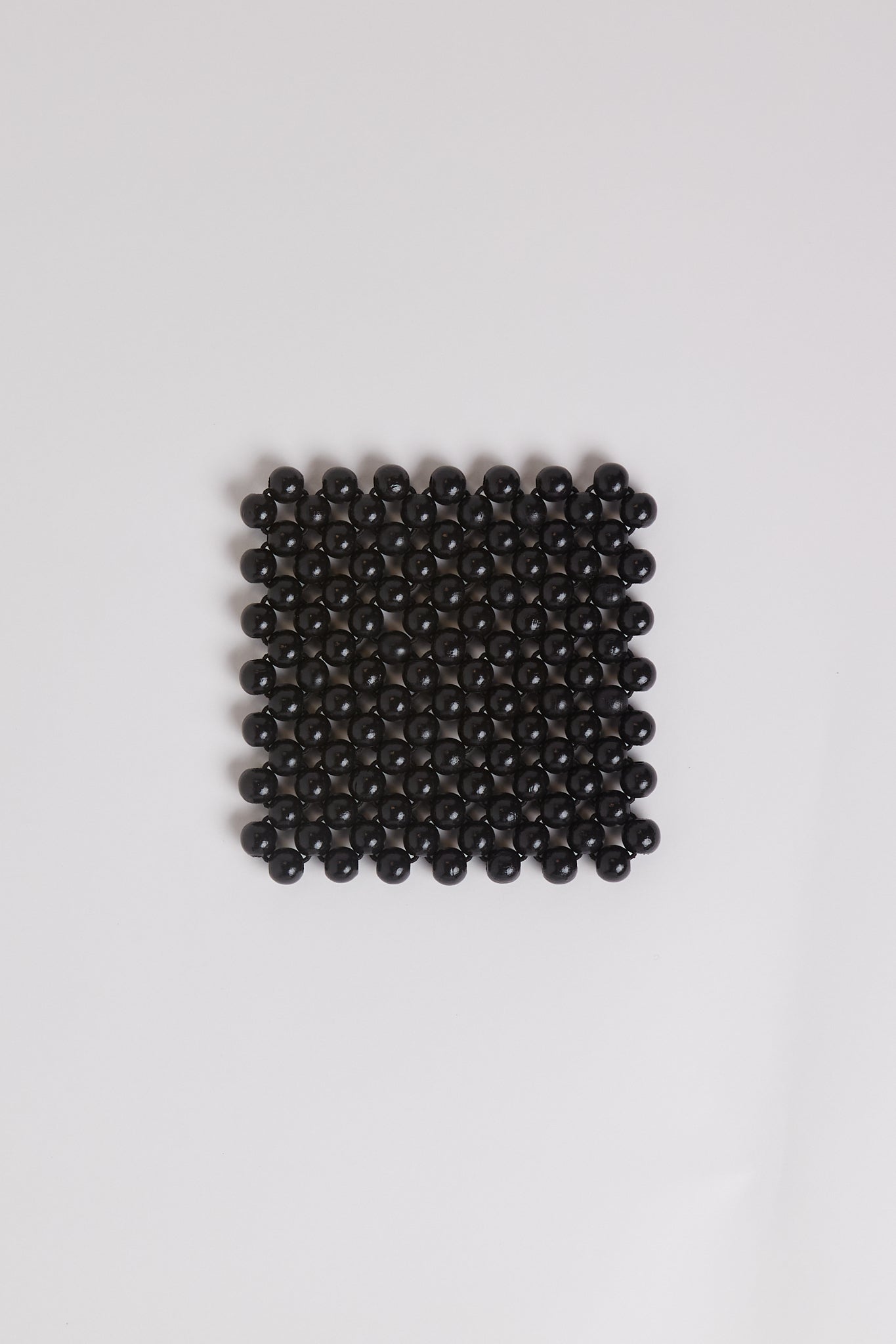 Pien Studios Black Lacquered Beaded Coasters, curated by Shop Sommer in San Francisco.