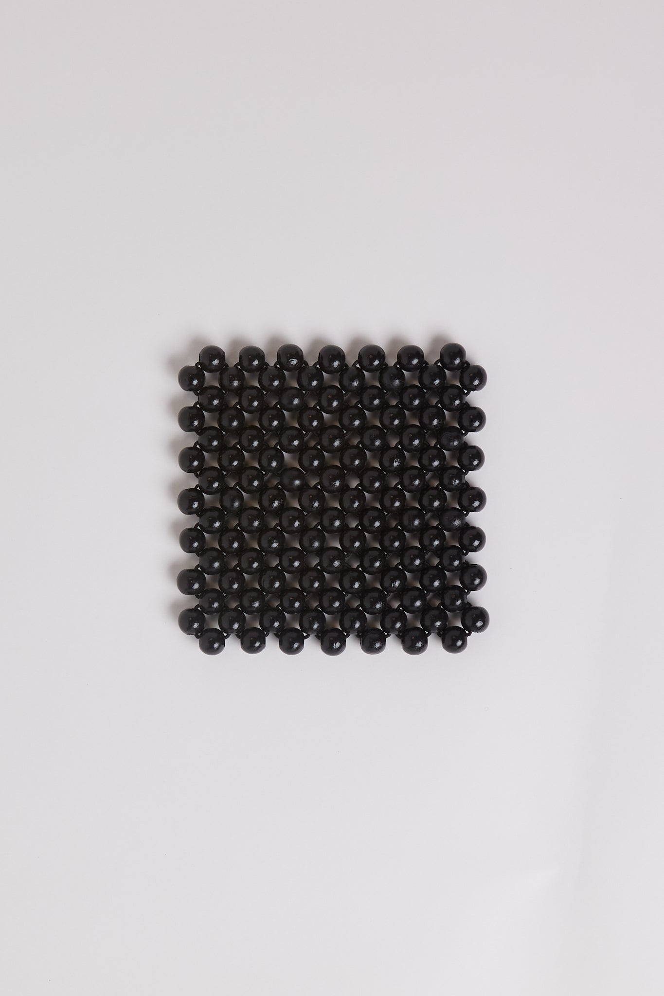 Pien Studios Black Lacquered Beaded Coasters, curated by Shop Sommer in San Francisco.