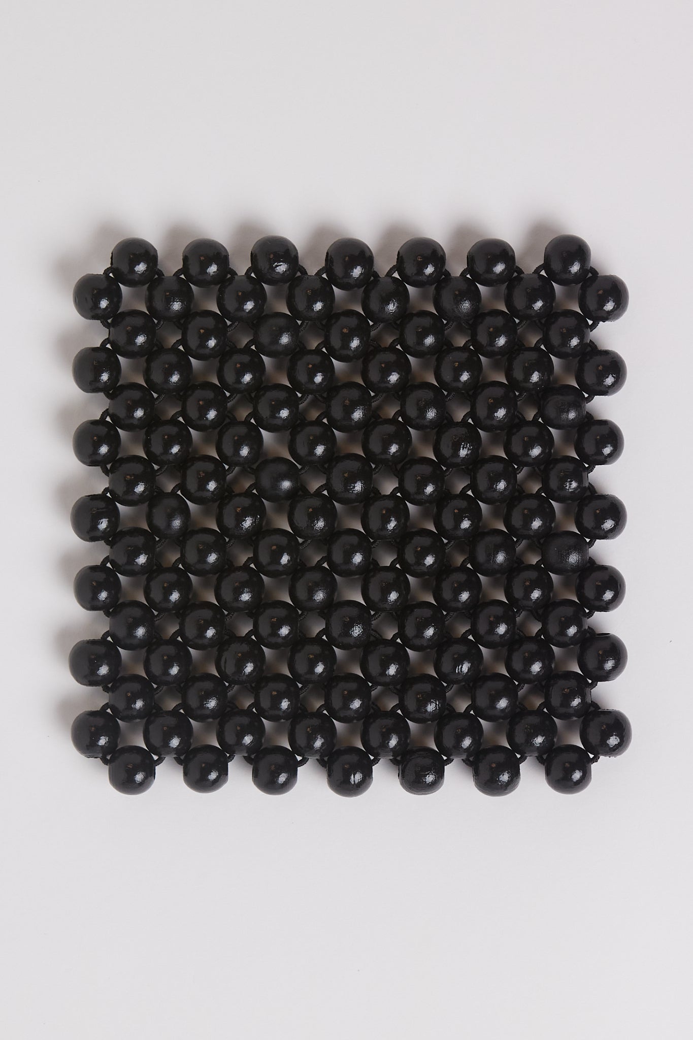 Pien Studios Black Lacquered Beaded Coasters, curated by Shop Sommer in San Francisco.