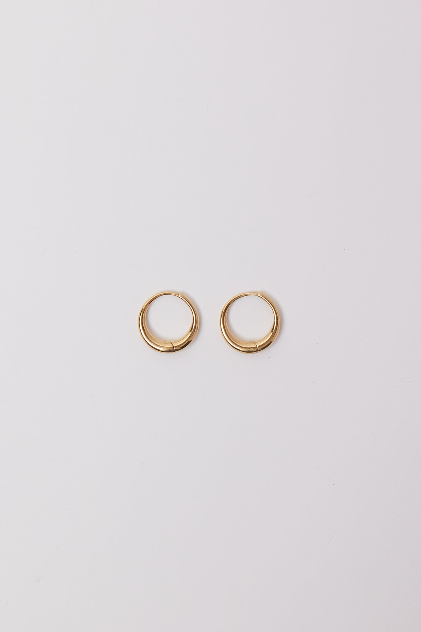 Sapir Bachar Gold Circle Hoops, curated by Shop Sommer in San Francisco.