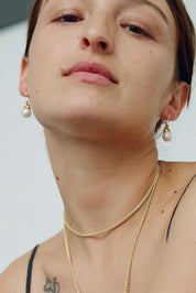 Sapir Bachar Gold Long Pearl Earrings, curated by Shop Sommer in San Francisco.