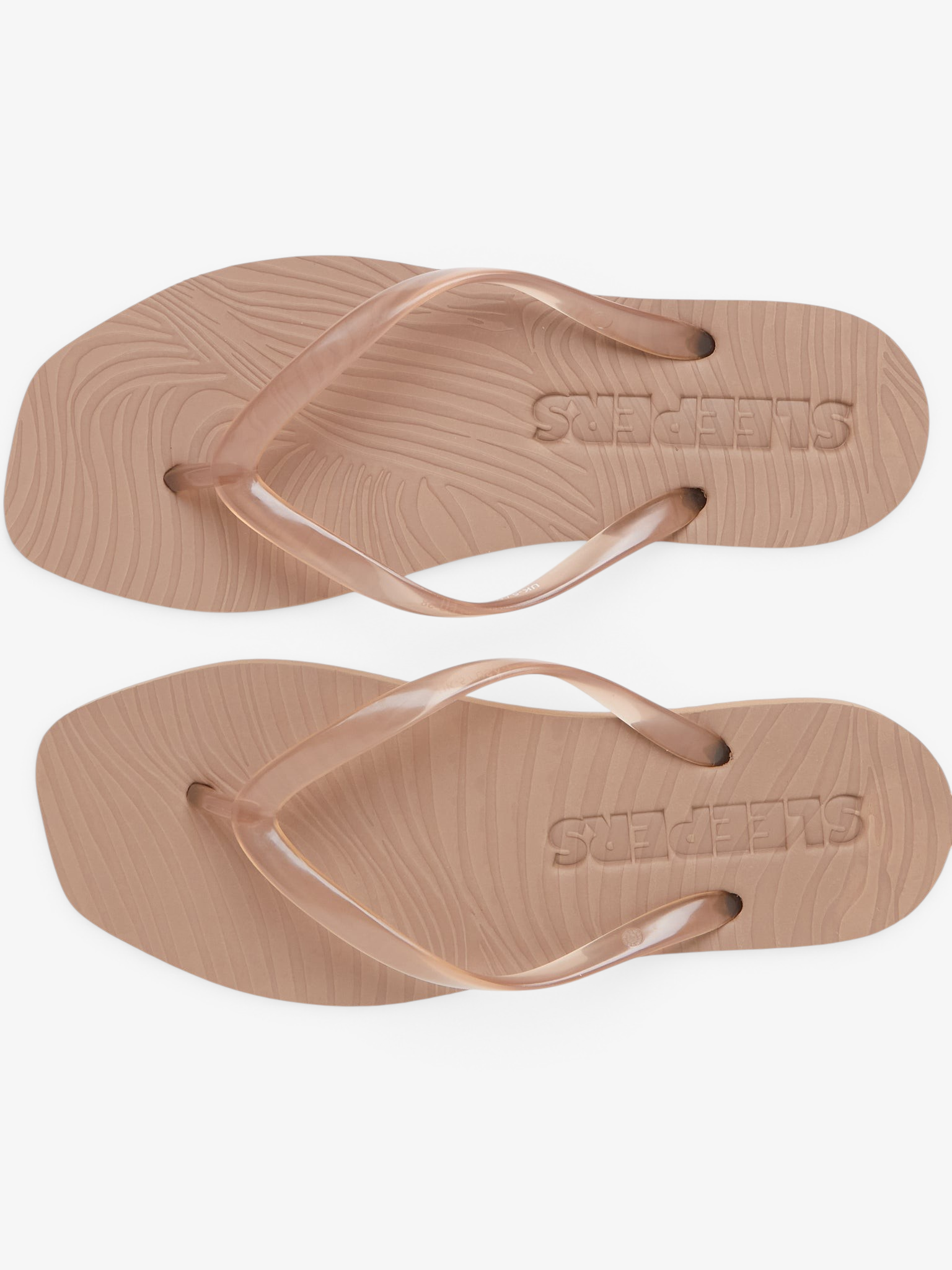 Tapered Flip Flop Sand Transparent from Sleepers, curated by Shop Sommer in San Francisco.