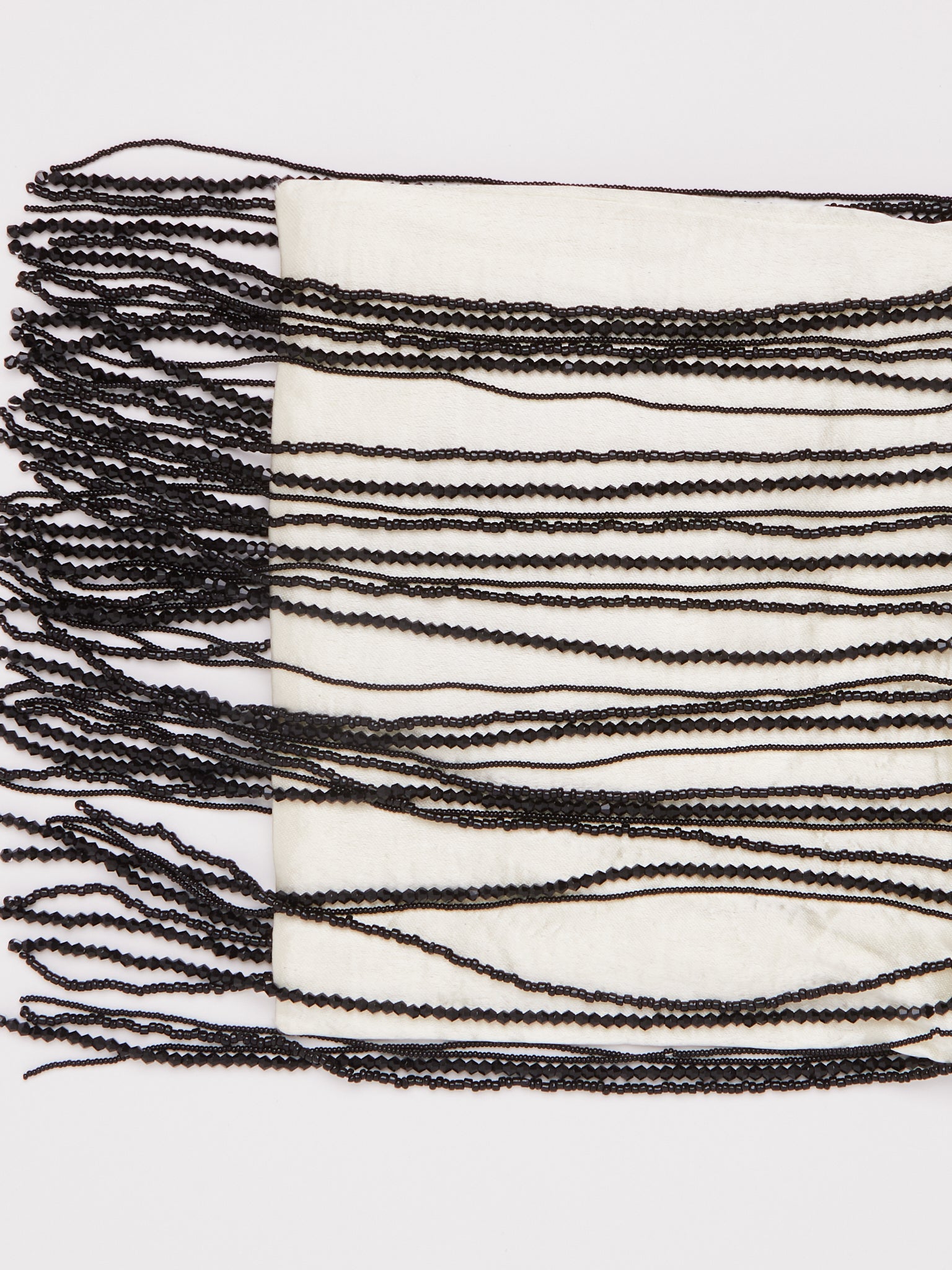 Tigra Tigra Beaded Fringe Wristlet Bag Pale Yellow, curated by Shop Sommer in San Francisco.

