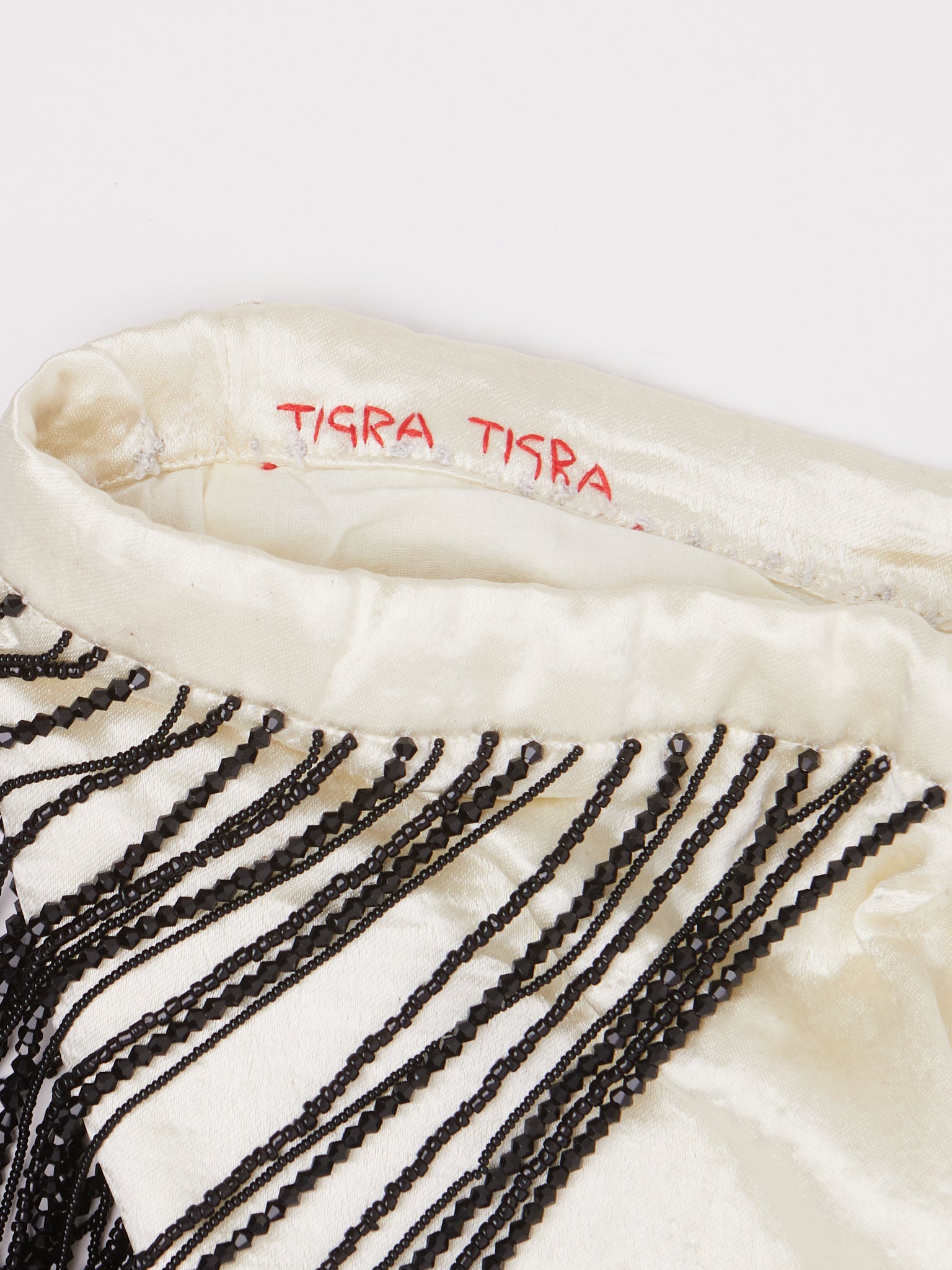 Tigra Tigra Beaded Fringe Wristlet Bag Pale Yellow, curated by Shop Sommer in San Francisco.

