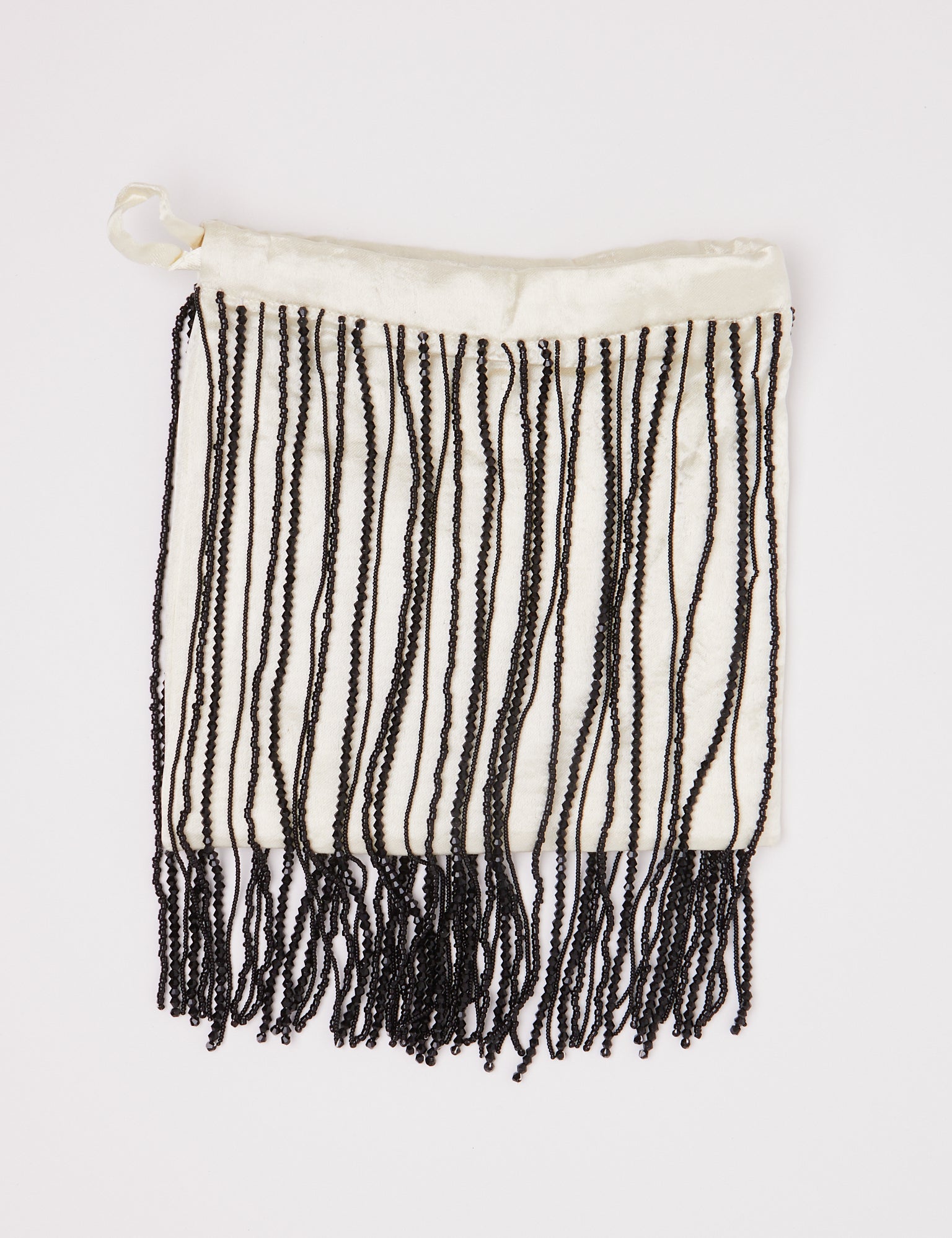 Tigra Tigra Beaded Fringe Wristlet Bag Pale Yellow, curated by Shop Sommer in San Francisco.
