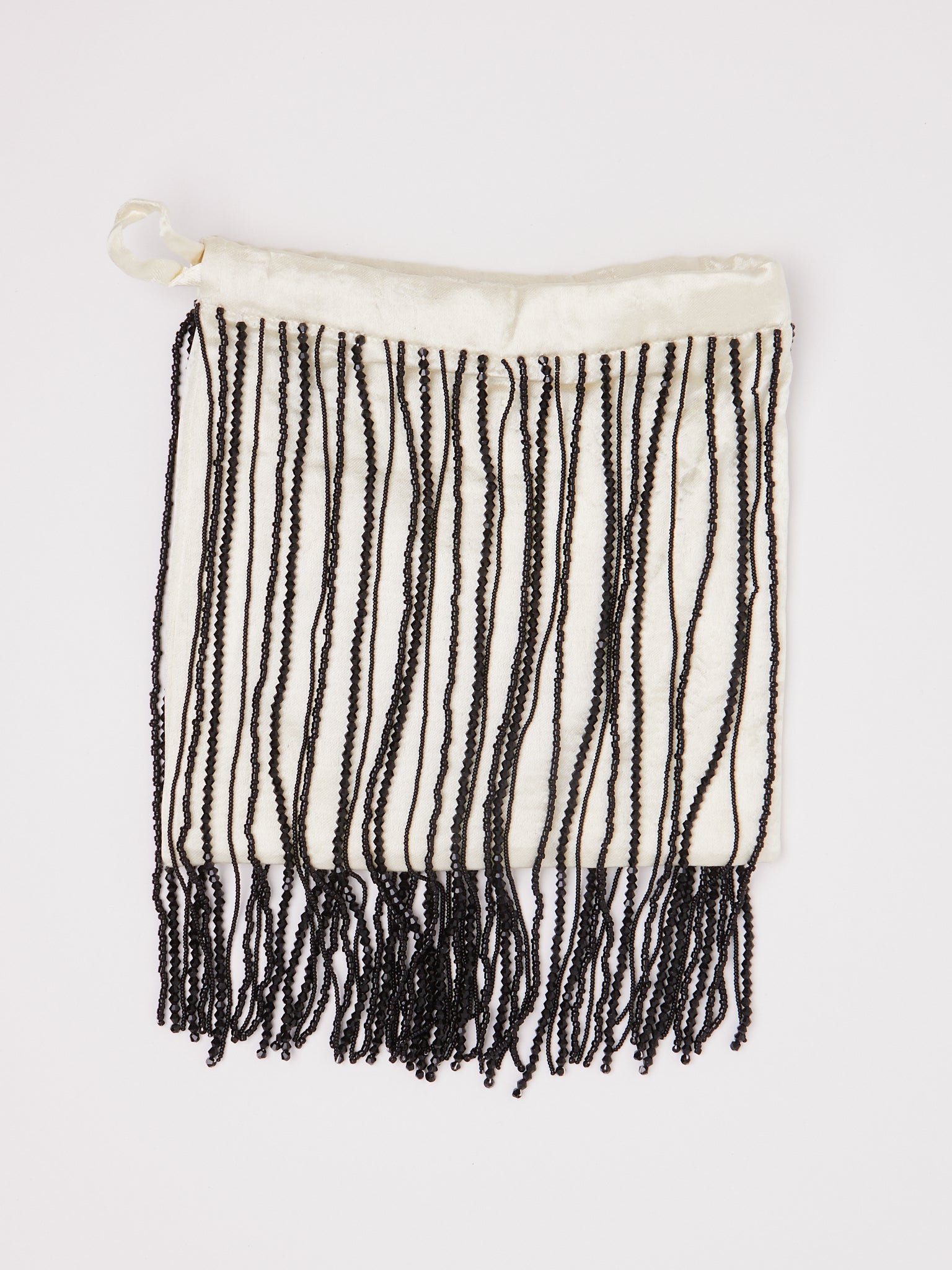 Tigra Tigra Beaded Fringe Wristlet Bag Pale Yellow, curated by Shop Sommer in San Francisco.
