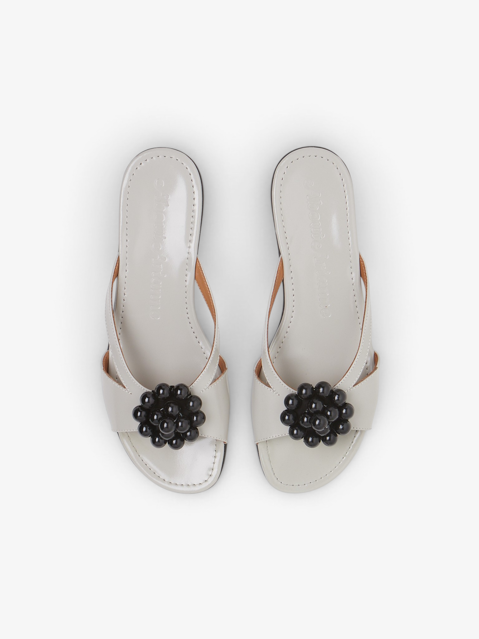 About Arianne Flora Grey Slip On Sandal, curated by Shop Sommer in San Francisco.
