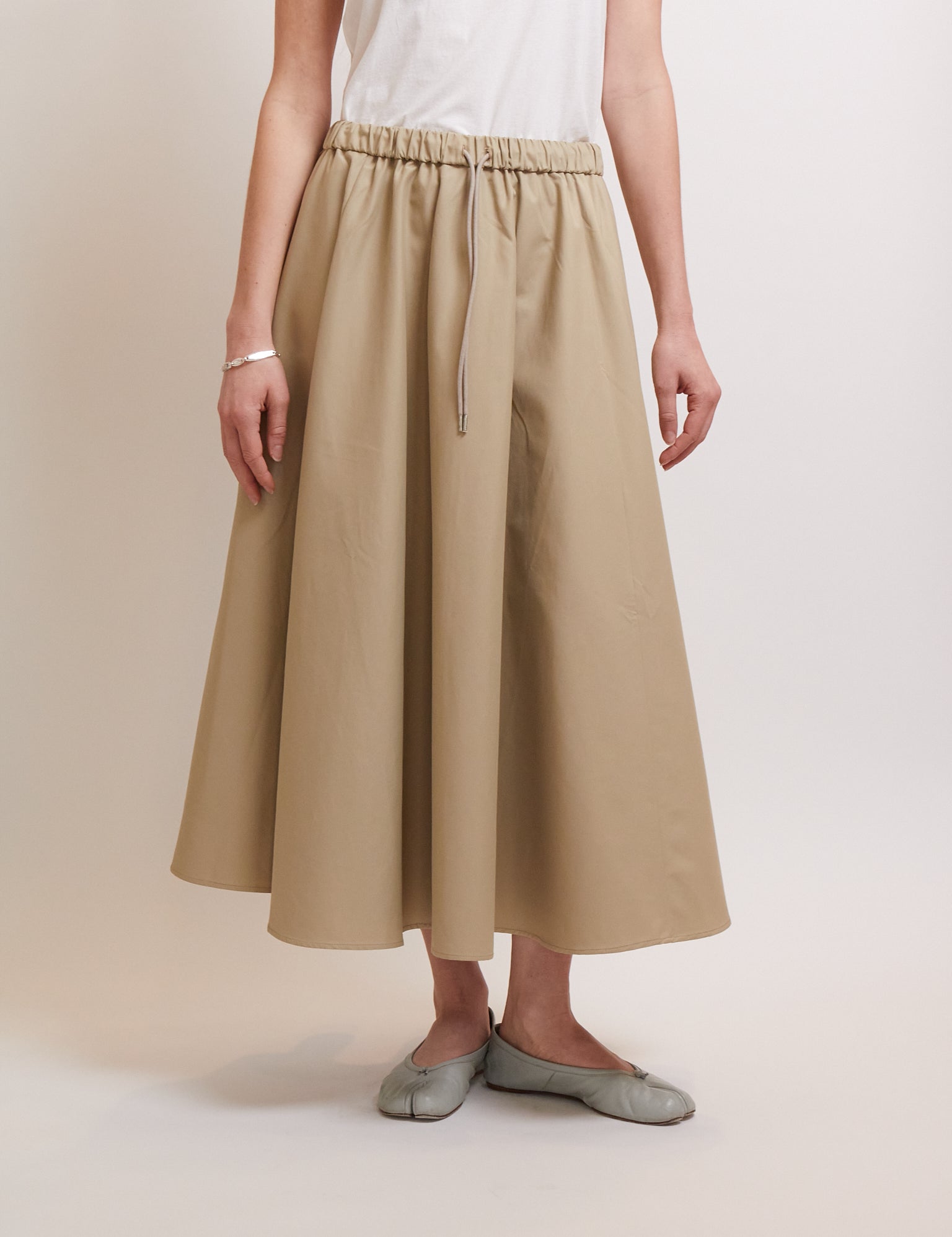 Cordera Technical Skirt Camel, curated by Shop Sommer in San Francisco.