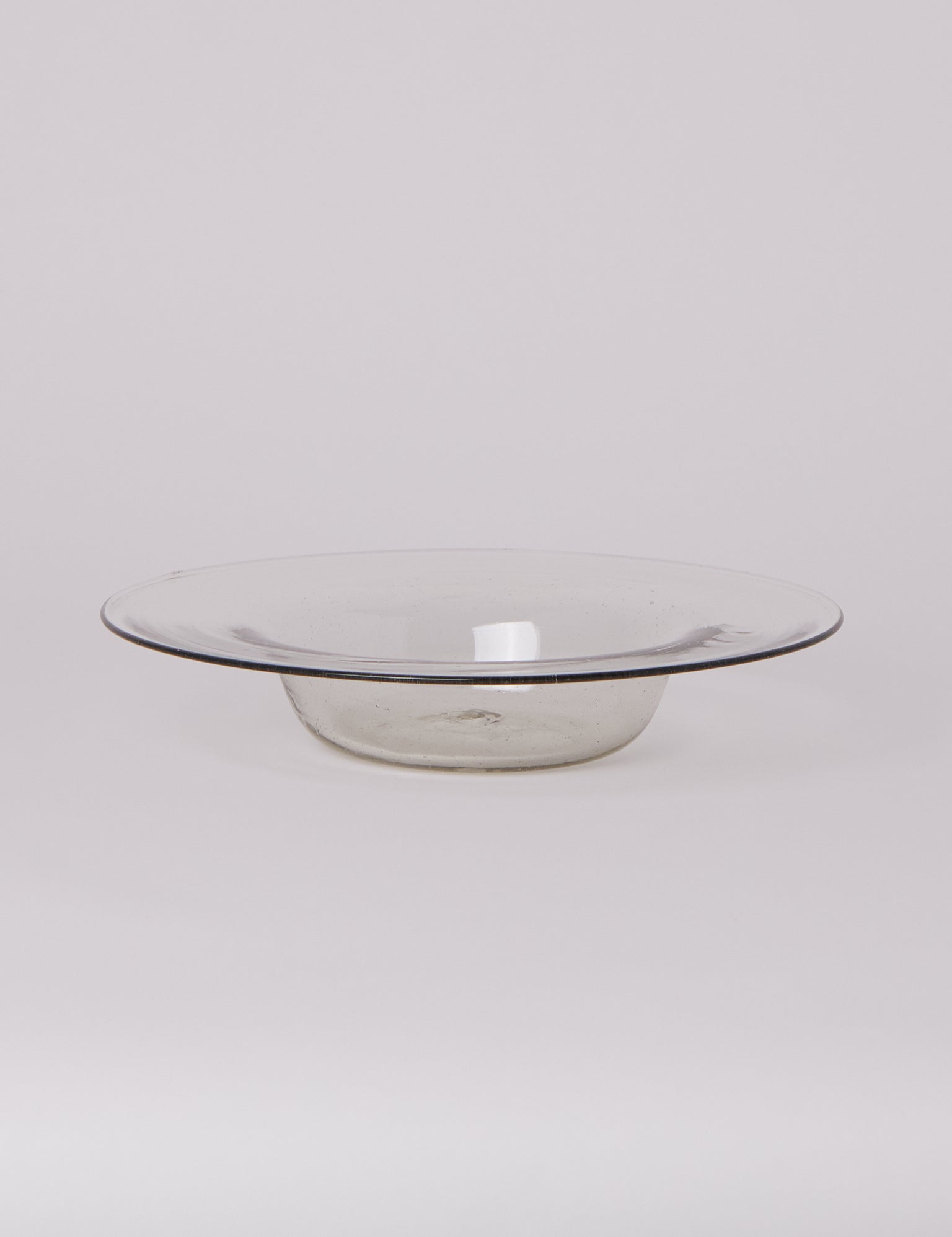 FRAMA Isle Glass Shallow Bowl in Light Smoke, curated by Shop Sommer in San Francisco.