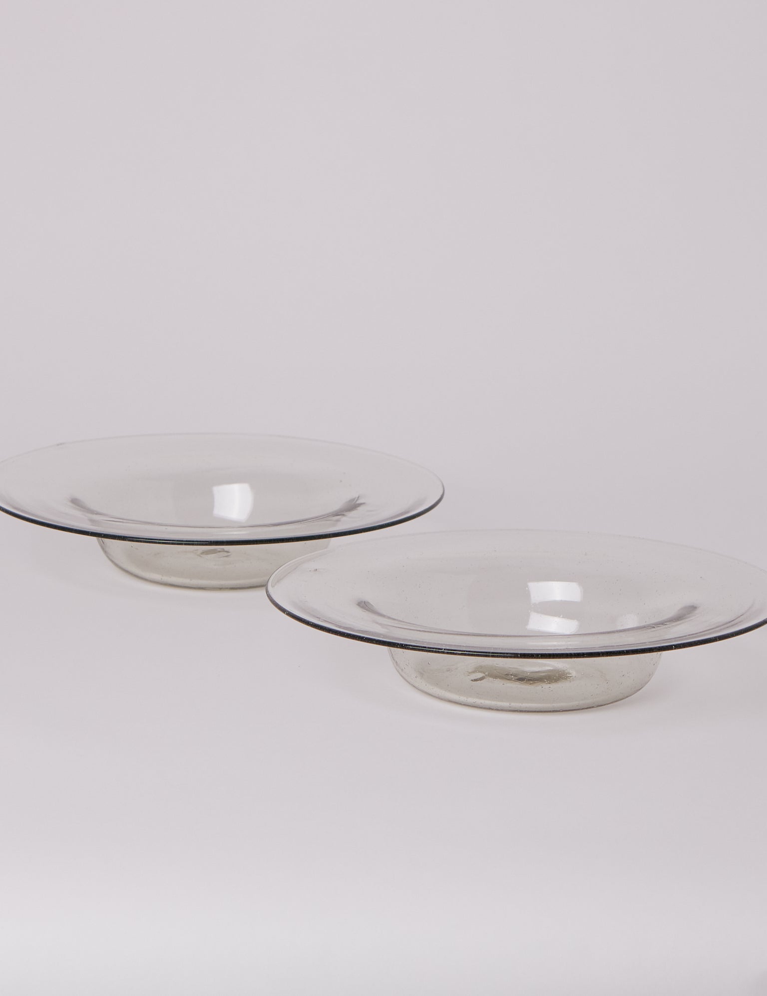FRAMA Isle Glass Shallow Bowl in Light Smoke, curated by Shop Sommer in San Francisco.