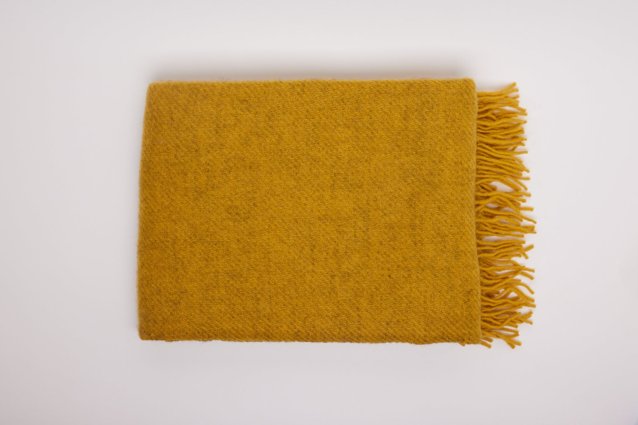 klippan-gotland-wool-throw-blanket-mustard-yellow-shop-sommer.jpg