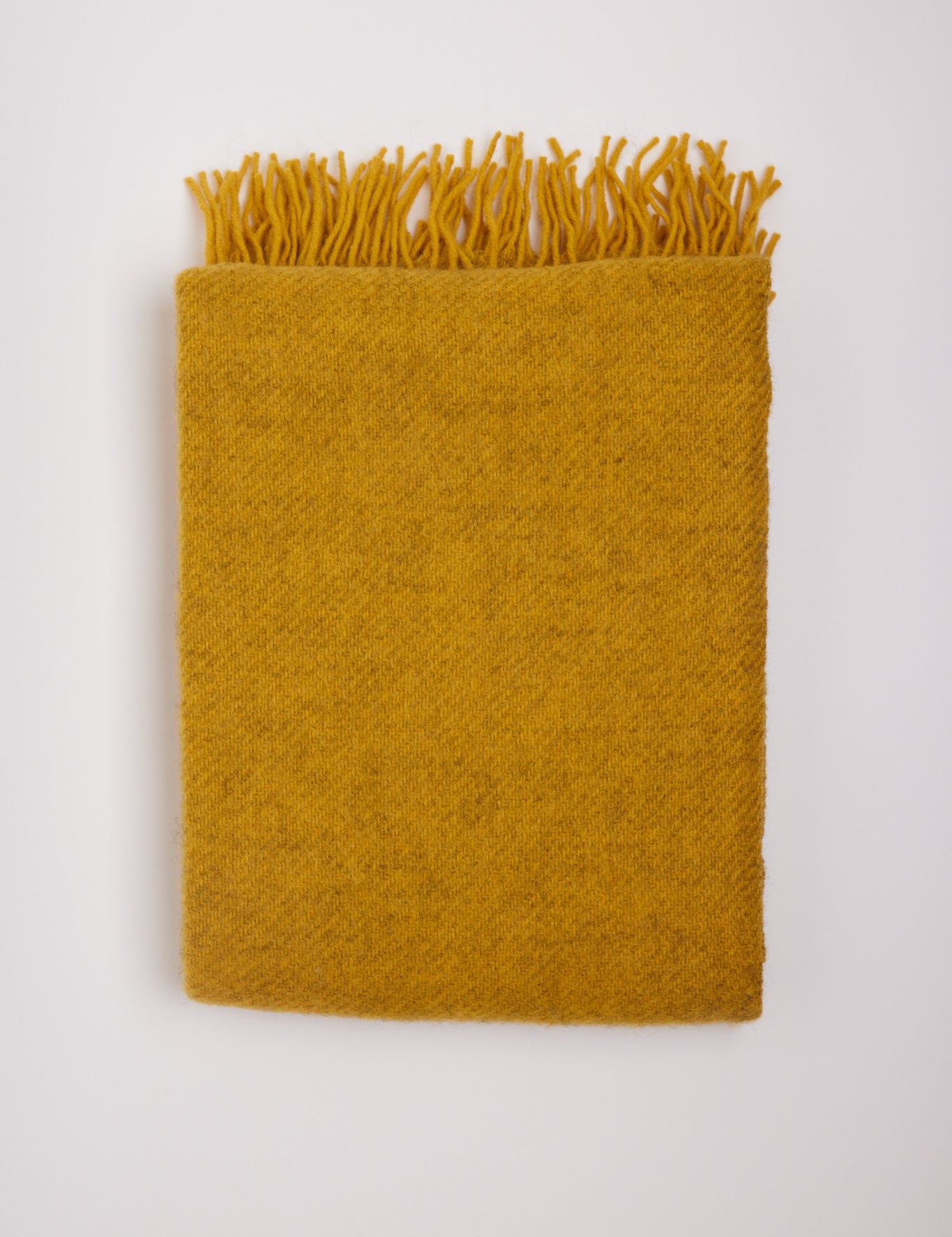 Klippan Gotland Wool Throw Blanket Yellow, curated by Shop Sommer in San Francisco.