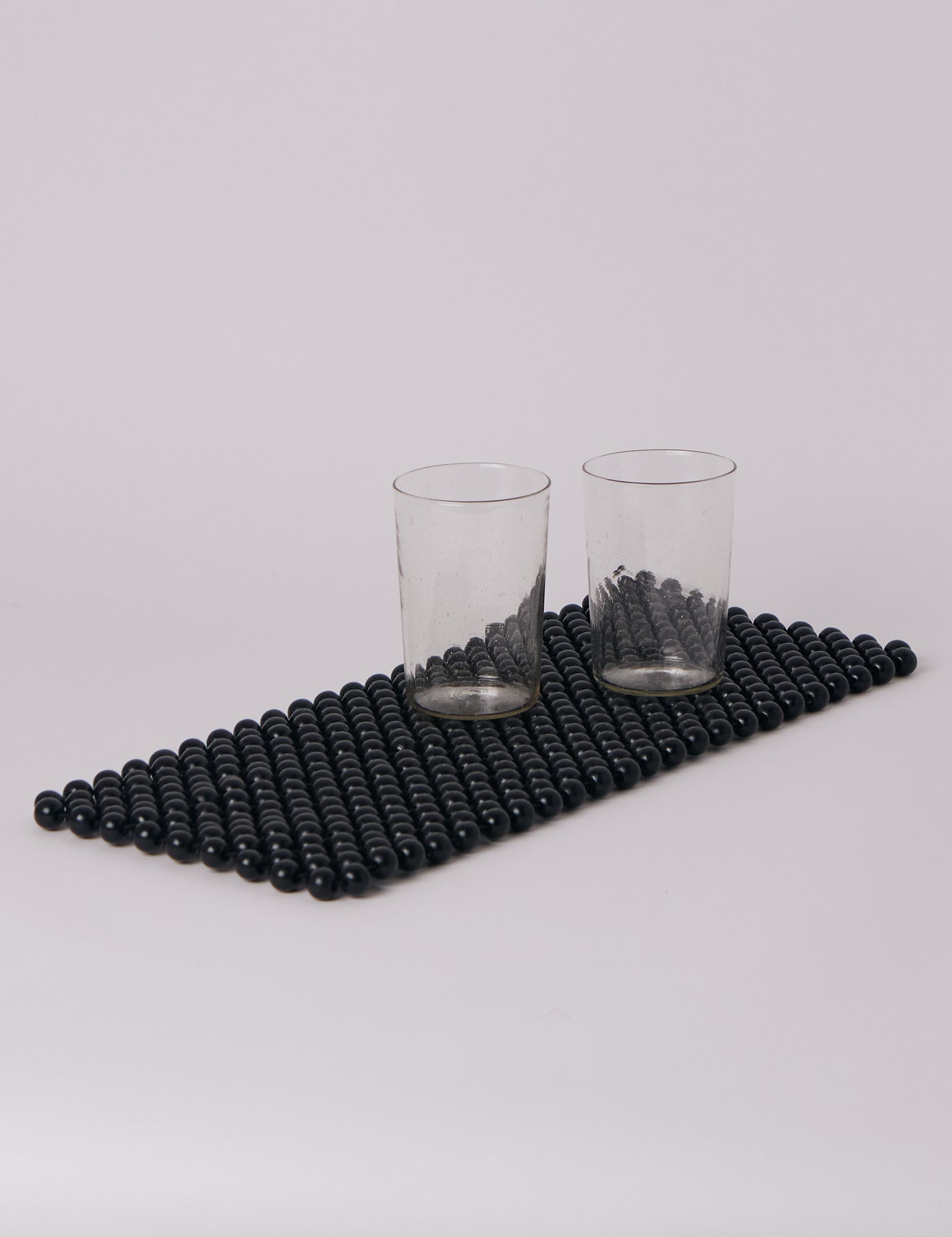 Black Beaded Table Runner by Pien Studios, curated by Shop Sommer in San Francisco.