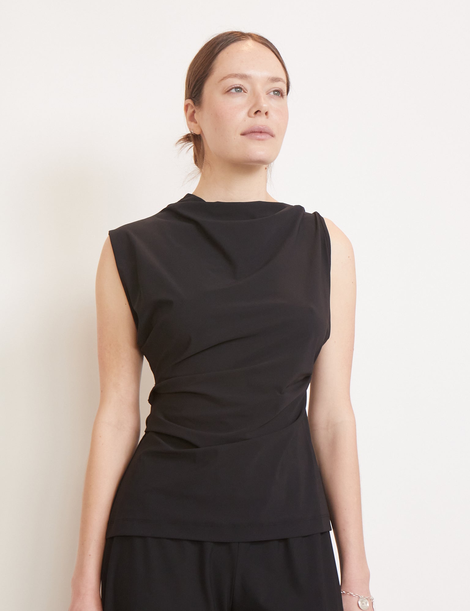 REYÈM Asymmetric Sleeveless Top Black, curated by Shop Sommer in San Francisco.