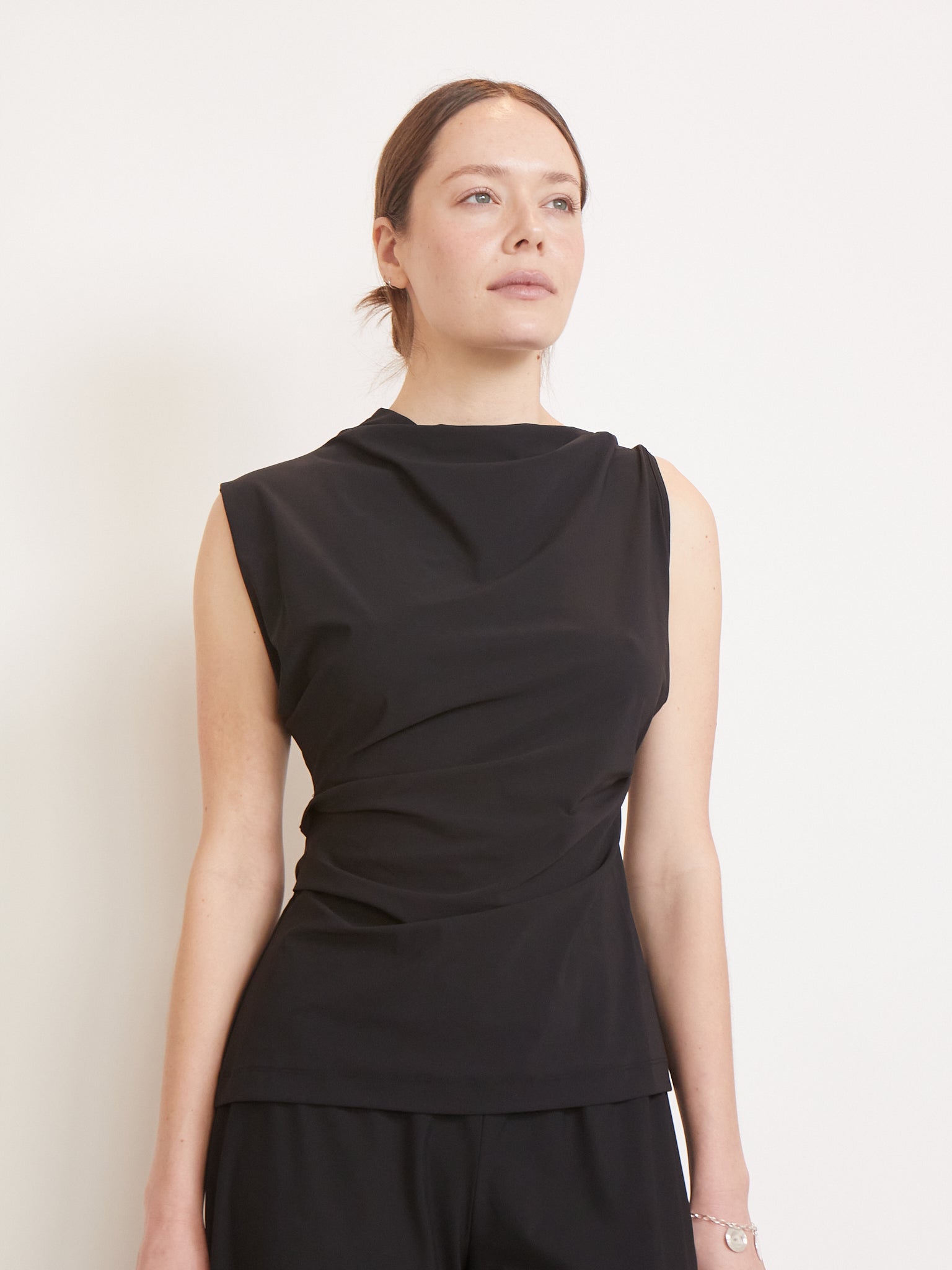 REYÈM Asymmetric Sleeveless Top Black, curated by Shop Sommer in San Francisco.