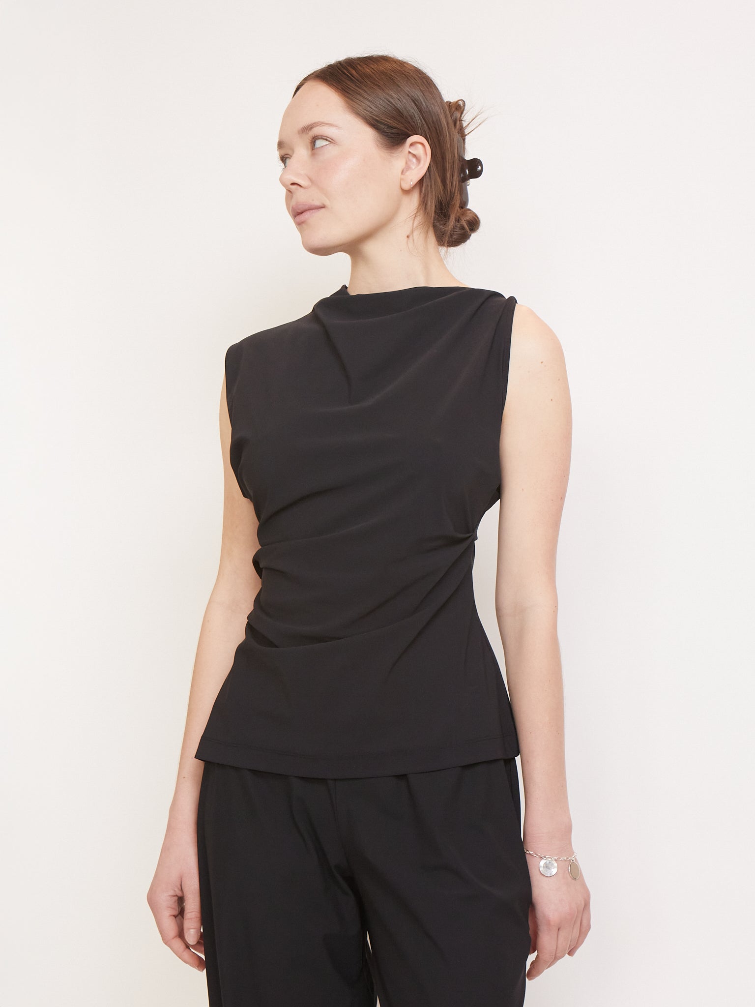 REYÈM Asymmetric Sleeveless Top Black, curated by Shop Sommer in San Francisco.